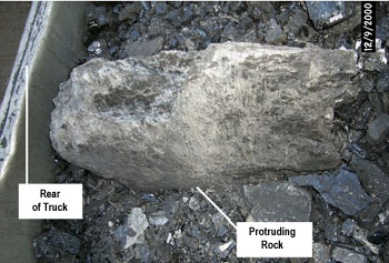 Photo showing rock in bed of truck