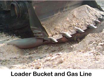 Photo of Loader Bucket and gas line